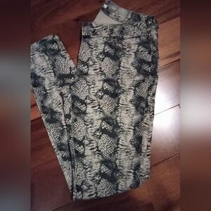Cabi size 4 snake jeans